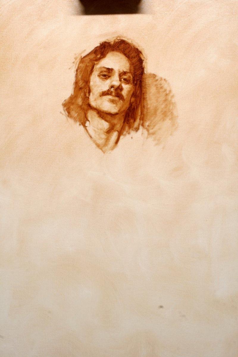 When I was living in California and before I had a family, I knew this man who was a former member of the Hell's Angels. Through church I was able to befriend him and as a result, he allowed me to take photos of him. For years I have wanted to paint his image and recently I found a space of time to complete a painting of him. With the exception of one other time, I have never recorded the process of a painting of this depth. I first started by toning my canvass with a transparent thin layer of Burnt Umber. After it dried I carefully placed the position of the head in relation to the overall format. I used Burnt Umber and Linseed oil for this process. The extended drying time of the Linseed oil allowed me to be free with my paint and allowed me to make immediate corrections in the drawing and composition.